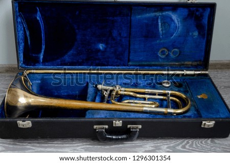 copper colored trombone