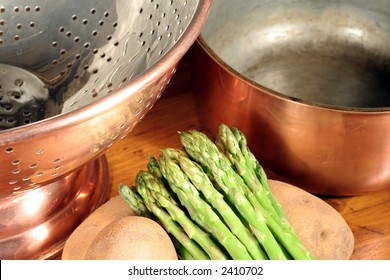 Copper Cookware And Vegetables