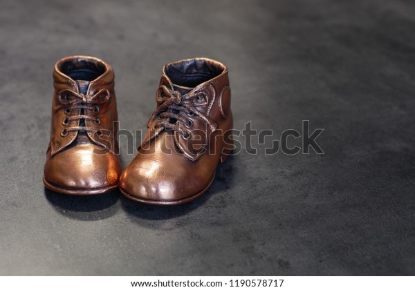 copper baby shoes