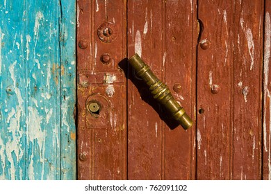 Copper Doorknob At Brown Blue Door Of House At Oasis Near Guelmim, Morocco