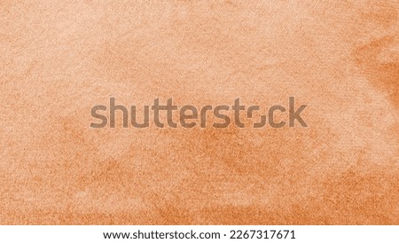 Copper gold velvet background or golden orange amber velour flannel texture made of cotton or wool with soft fluffy velvety satin fabric cloth metallic color material   
