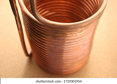 A Copper Immersion Heat Exchanger (chiller) Which Is Used In The Craft Beer Making Process. Homebrewing Concept Image. This Image Has Selective Focus. 