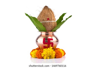 Copper Kalash with coconut and mango leaf with floral decoration on a white background. Essential in Hindu Puja. - Powered by Shutterstock