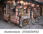 Copper market store in Nepal Asia. Store full with copper pots and pans and all other objects.