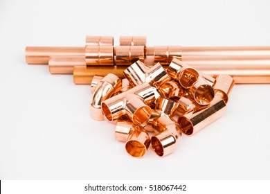The copper pipes and armature on the white background