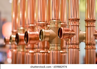 Copper pipes. Close up of copper pipes used in plumbing and heating systems