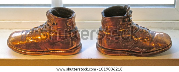 copper plated baby shoes
