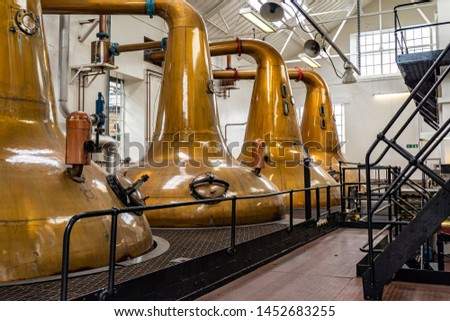Copper pot stills in a scotch distillery