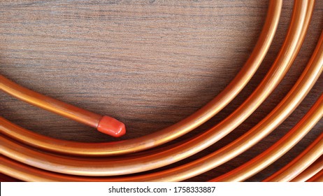 Copper Tube For Air Conditioner Put On Wooden Floor