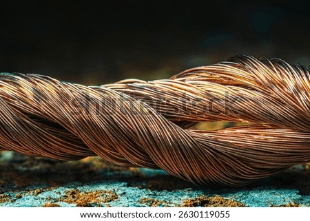 Copper wire on rusted metal background