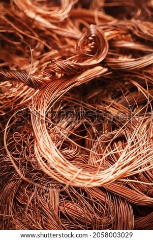 Copper wire texture background in full screen. Scrap of non-ferrous metals. Recycling