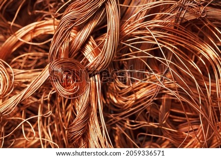 Copper wire texture background in full screen. Scrap of non-ferrous metals. Recycling