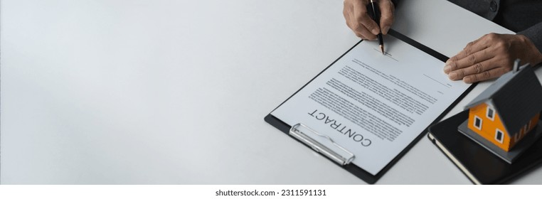 copy space, banner, panorama Inspection Read the details and sign the house purchase contract. Businessman, investor, insurance agent, investment analysis. Home loan. Real estate business concept. - Shutterstock ID 2311591131