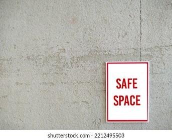 Copy Space Empty Wall With Sign SAFE SPACE, Places Where People Can Feel Confident - Free Of Bias, Conflict, Criticism Or Discrimination, No Emotional Or Physical Harm