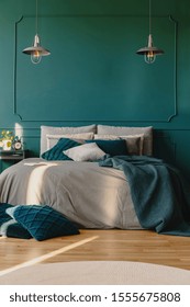 Copy Space On Empty Green Wall Of Elegant Bedroom Interior