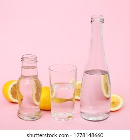 Copy Space, On A Pink Background Glass, Jars, Glasses, Glasses For A Cocktail With Water, Lemon, High Fashion, For The Inscription