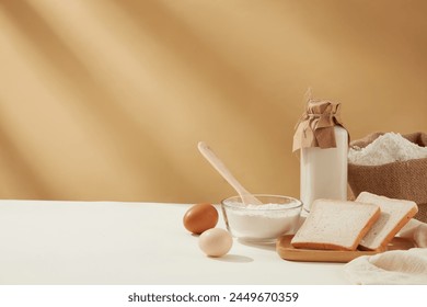 Copy space photo of baking homemade cake on light brown background with some essential ingredients for cooking, culinary concept, copy space, front view - Powered by Shutterstock