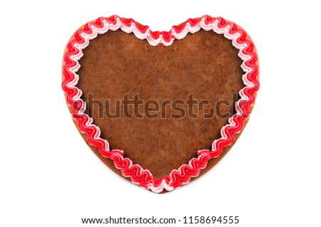 Copy space at red Oktoberfest (Octoberfest event in Munich) Gingerbread heart with white isolated background