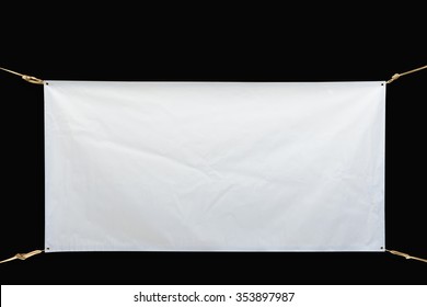 Copy space for text on disastrously white vinyl banner on black background .Clipping path