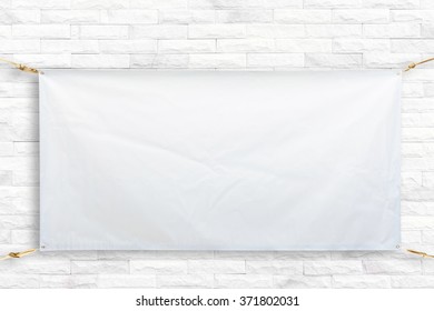 Copy Space For Text On Disastrously White Vinyl Banner On White Brick Background .Clipping Path Horizontal .sign Background