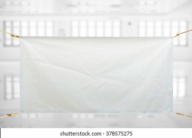 Copy Space For Text On White Vinyl Banner On White Storehouse
 Background .Clipping Path