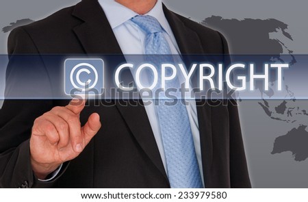 Copyright - Businessman with touchscreen