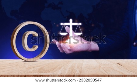 Copyright concept, author rights and patented intellectual property, Copyright Symbol Protection Sign on wooden table. Register Trademark and Logo