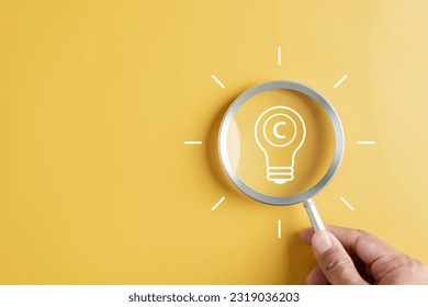 Copyright protect idea concept, author rights and patent intellectual property, Copyright icon inside light bulb.