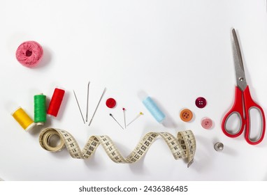 Copyspace frame with different sewing accessories: scissors, threads, needles, tape measures, buttons, etc. - Powered by Shutterstock