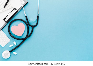 Copy-space Heart Shape And Stethoscope On Medical Desk Flat Lay Blue