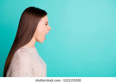 Copyspace Photo Of Outraged Evil Screaming Bossy Girlfriend Standing Side Profile Arguing With Someone Wearing Knitted Pullover While Isolated With Turquoise Color Vibrant Background