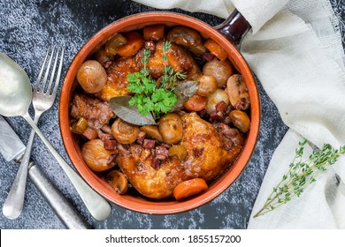 Coq Au Vin - French Dish Of Chicken, Baconm Mushrooms And Vegetables Braised With Red Wine - Overhead View