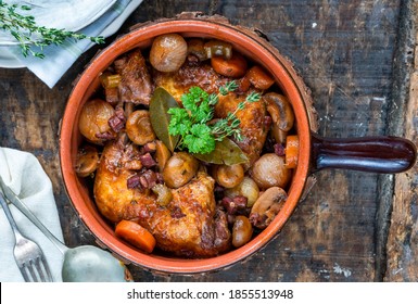 Coq Au Vin - French Dish Of Chicken, Baconm Mushrooms And Vegetables Braised With Red Wine - Overhead View