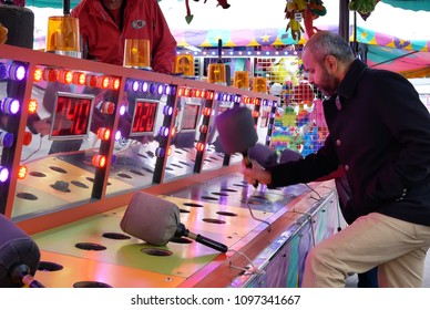 Coquitlam, BC, Canada - April 15, 2018 : Motion Of People Playing Whack Game At The West Coast Amusements Carnival