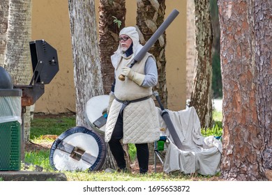 Coral Springs, Florida / USA - 10/6/2019: Grown Men Some In Costume With Fake Swords And Shields Practice Battling In Orchid Park For Renaissance Fair Festival. Live Action Role Play Aka LARPing