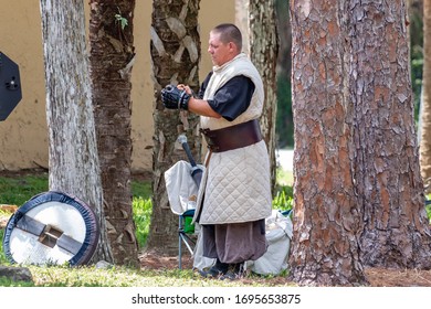 Coral Springs, Florida / USA - 10/6/2019: Grown Men Some In Costume With Fake Swords And Shields Practice Battling In Orchid Park For Renaissance Fair Festival. Live Action Role Play Aka LARPing