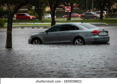 Coral Springs, Florida, USA - November 08, 2020: Car Stuck In Water During Hurricane Eta. Street Flood.