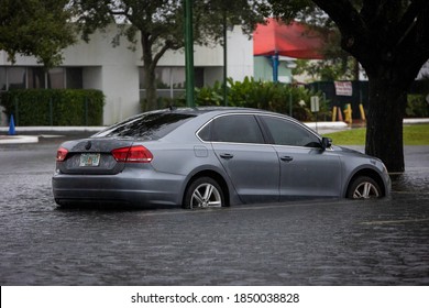 Coral Springs, Florida, USA - November 08, 2020: Car Stuck In Water During Hurricane Eta. Street Flood.