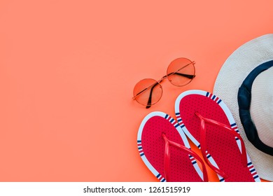 Coral ummer fashion flatlay and gradient round sunglasses  straw hat   red flats  Perfect beach set for holidays the sea  Marina style 