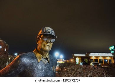 Coralville, Iowa, USA - 1/2019: Statue Of Hayden Fry, A Famous University Of Iowa Football Coach                                