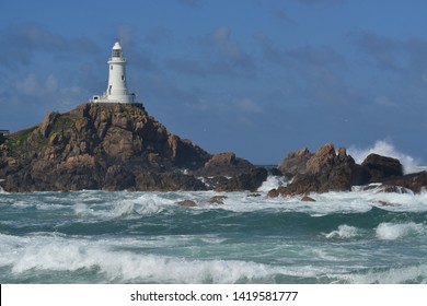 Corbiere Lighthouse, Jersey, UK. Coastal Structure After Storm.