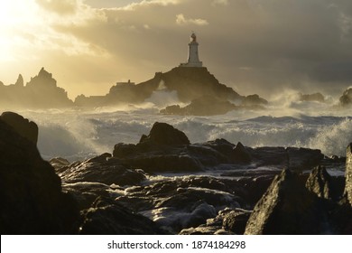 Corbiere lighthouse, Jersey, U.K. Winter storm around a coastal landmark.
