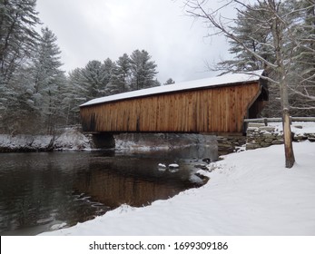 The Corbin Covered Bridge, located in Newport New Hampshire, during winter.