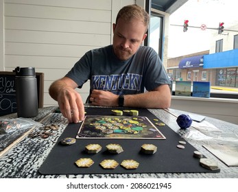 Corbin, Kentucky - June 7, 2021: Playing board games at the local coffee shop