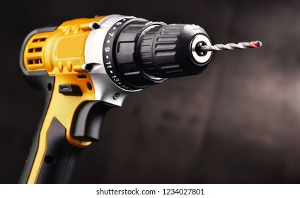 Cordless Drill With Drill Bit Working Also As Screw Gun.