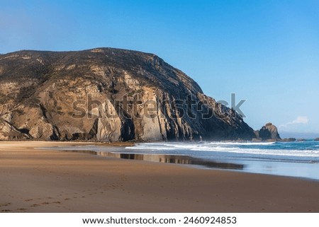 Similar – Aerial Drone View Of Blue Ocean Waves And Beautiful Sandy Beach Shore in Portugal