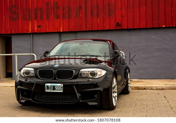Cordoba, Argentina. Year 2017: front view of a\
black BMW 1M. Sports car\
parked.