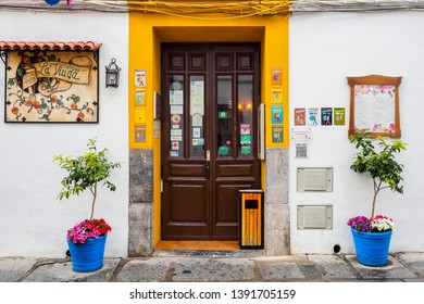 CORDOBA, SPAIN -April 8, 2019: The beautiful facade of a vintage restaurant in the old town
