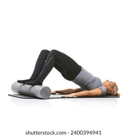 Core exercise, foam roller and studio woman with bridge workout, balance activity or wellness for gym pilates on floor. Fitness, mockup space and girl body development on yoga mat on white background