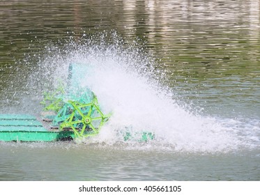 Core Of Green PADDLE WHEEL AERATOR With Water Splash Is Working In Pool (moving And Little Blur Mode)